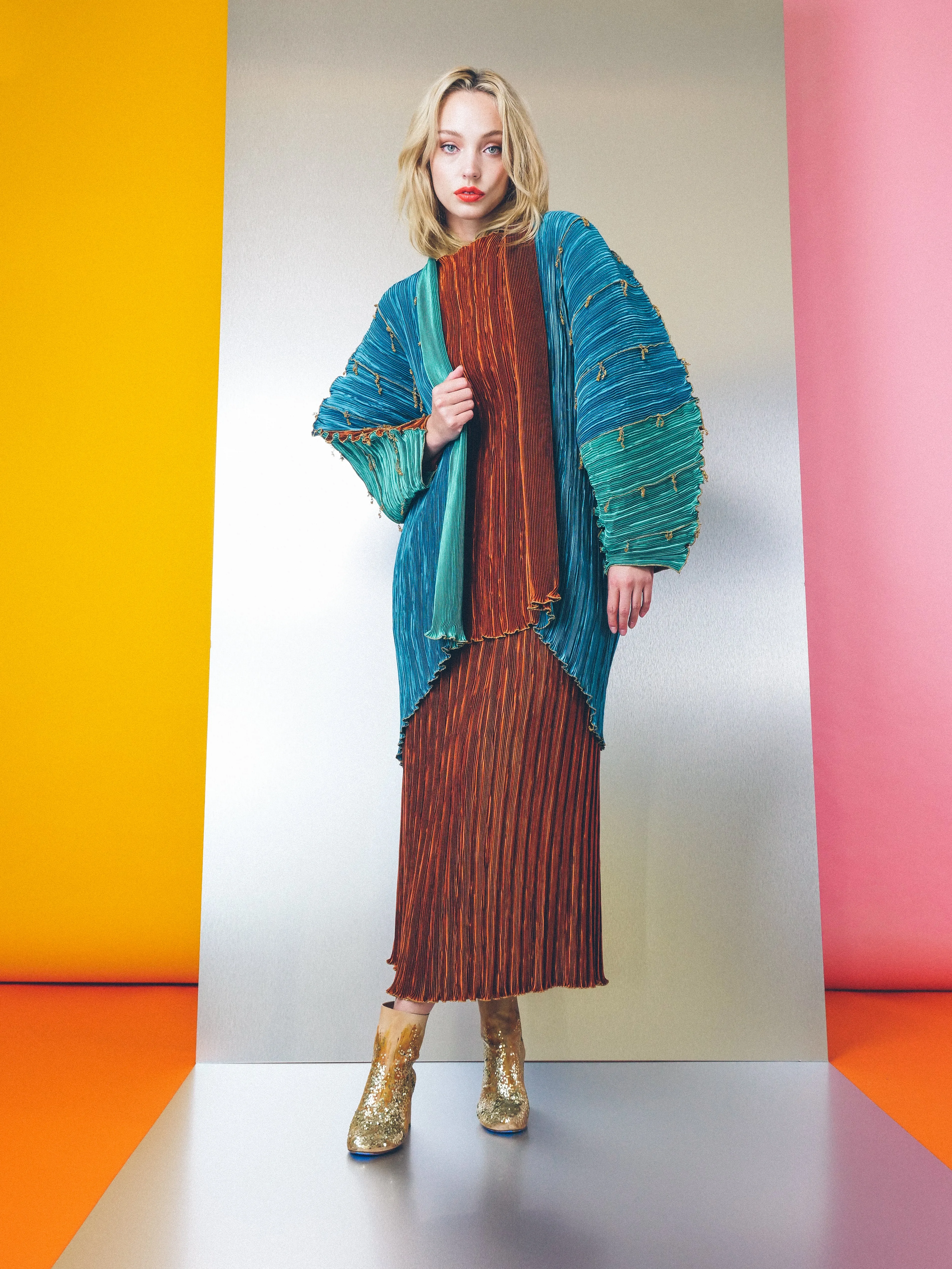 Pleated Structural Jacket and Skirt Ensemble