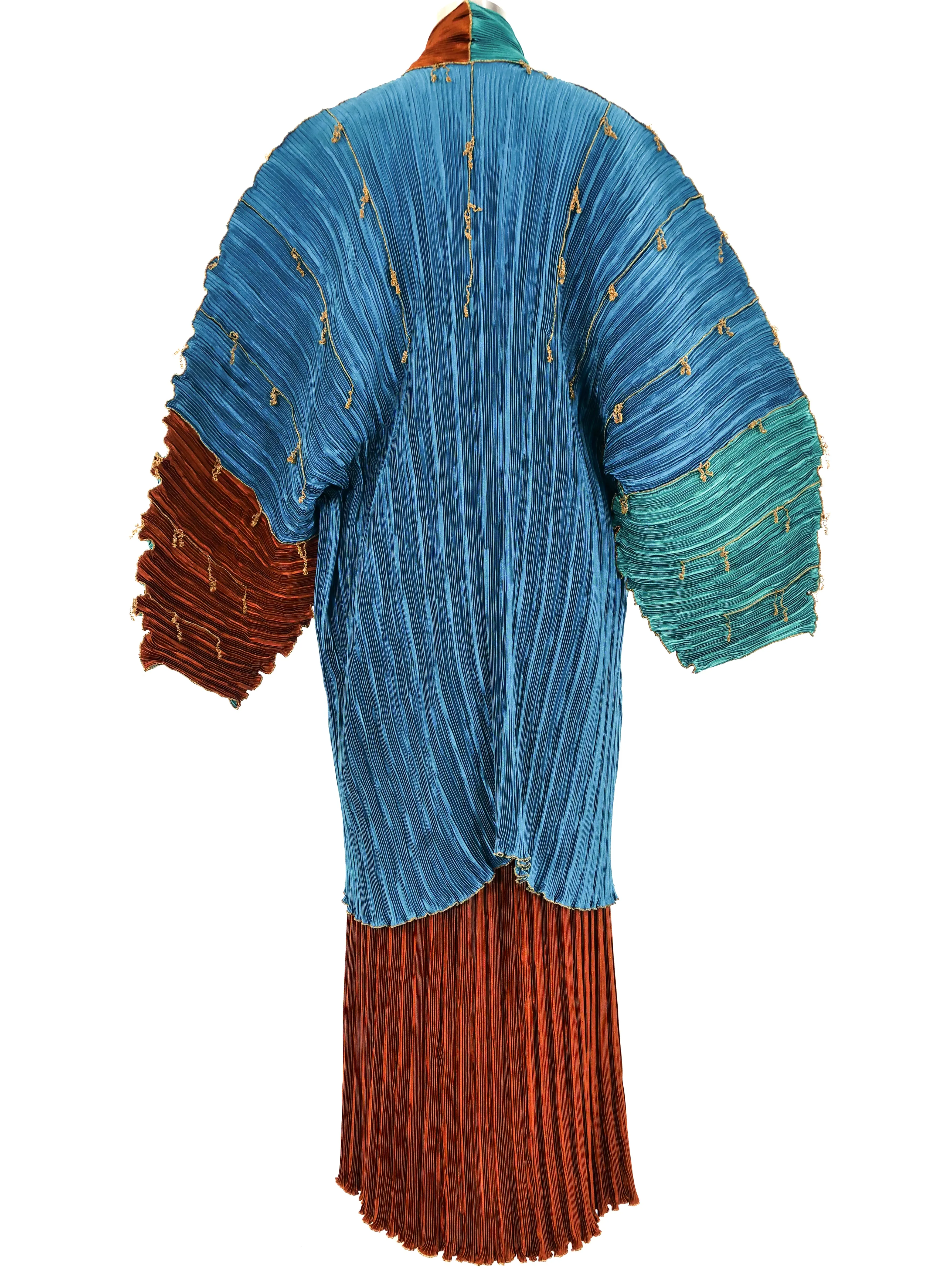 Pleated Structural Jacket and Skirt Ensemble