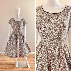 Vintage 1950s Black and White Cotton Day Dress with Rhinestones / 50s retro polka dot fit and flare casual dress with pockets / 